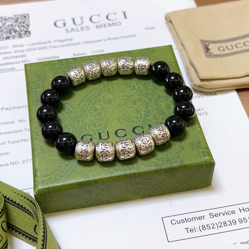 G*u*i bracelets